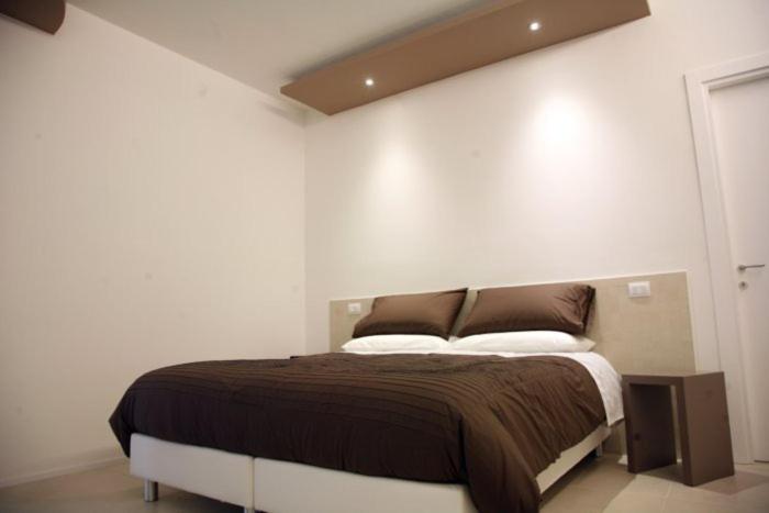 Postel nebo postele na pokoji v ubytování Cantina Loft