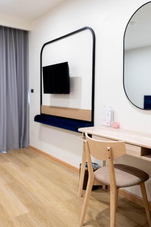 TV a/nebo společenská místnost v ubytování CA Hotel and Residence Phuket - SHA Extra Plus