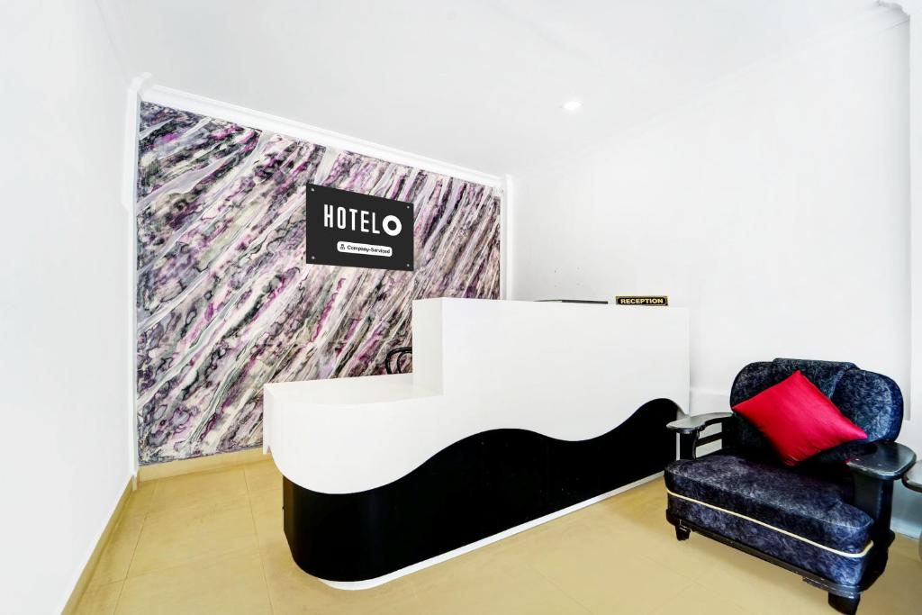 Postel nebo postele na pokoji v ubytování Super Hotel O Sultan Bathery formerly Bluevalley