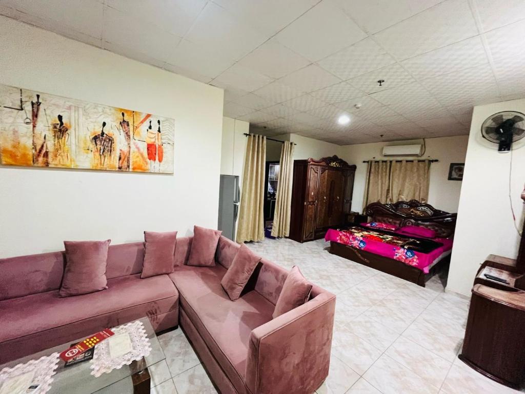 Ένα ή περισσότερα κρεβάτια σε δωμάτιο στο International Welcome Residence,Studio Appartment