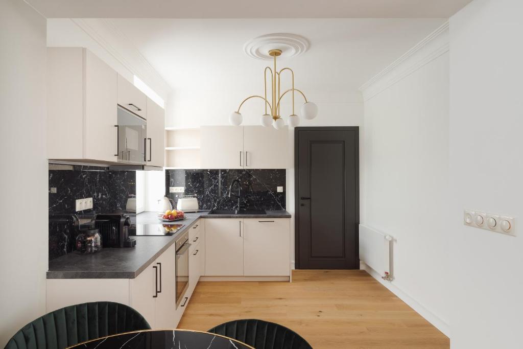 Kuchyň nebo kuchyňský kout v ubytování BICE apartments & Wellness