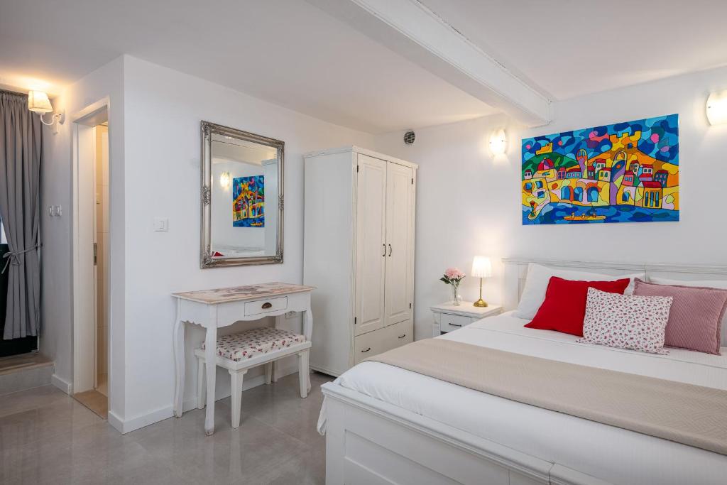 Posteľ alebo postele v izbe v ubytovaní Apartment Stulli 1