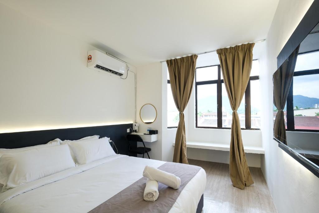 Postel nebo postele na pokoji v ubytování Loft 82