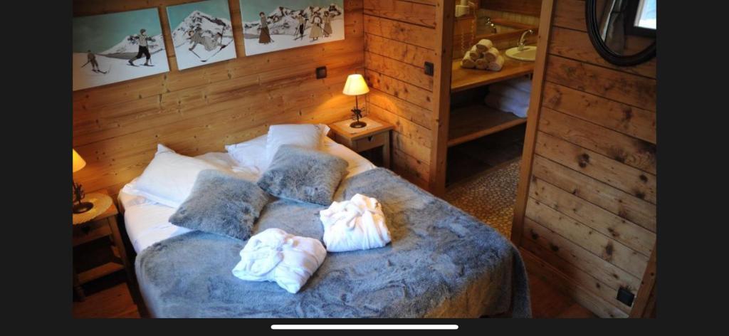 Postel nebo postele na pokoji v ubytování Hôtel Chalet Alpage