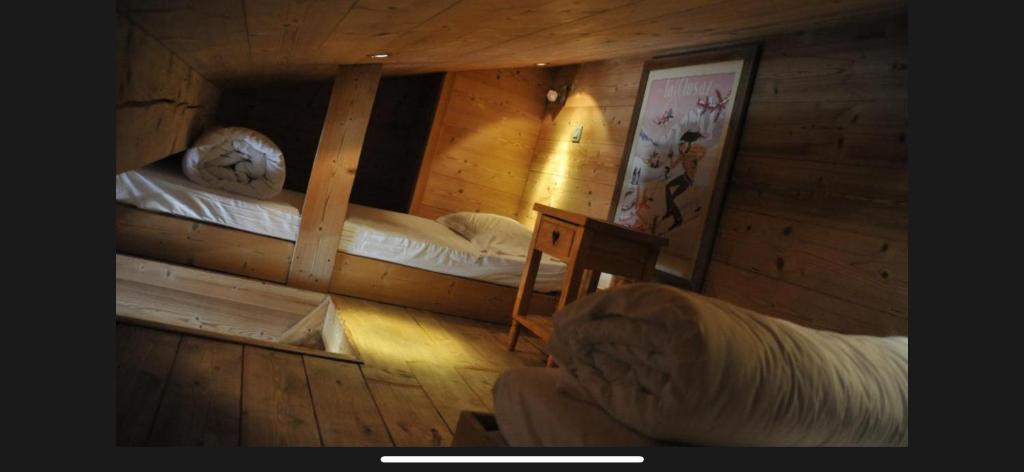 Postel nebo postele na pokoji v ubytování Hôtel Chalet Alpage