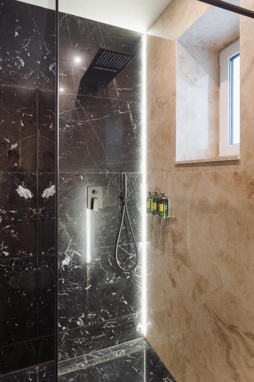 Koupelna v ubytování BICE apartments & Wellness