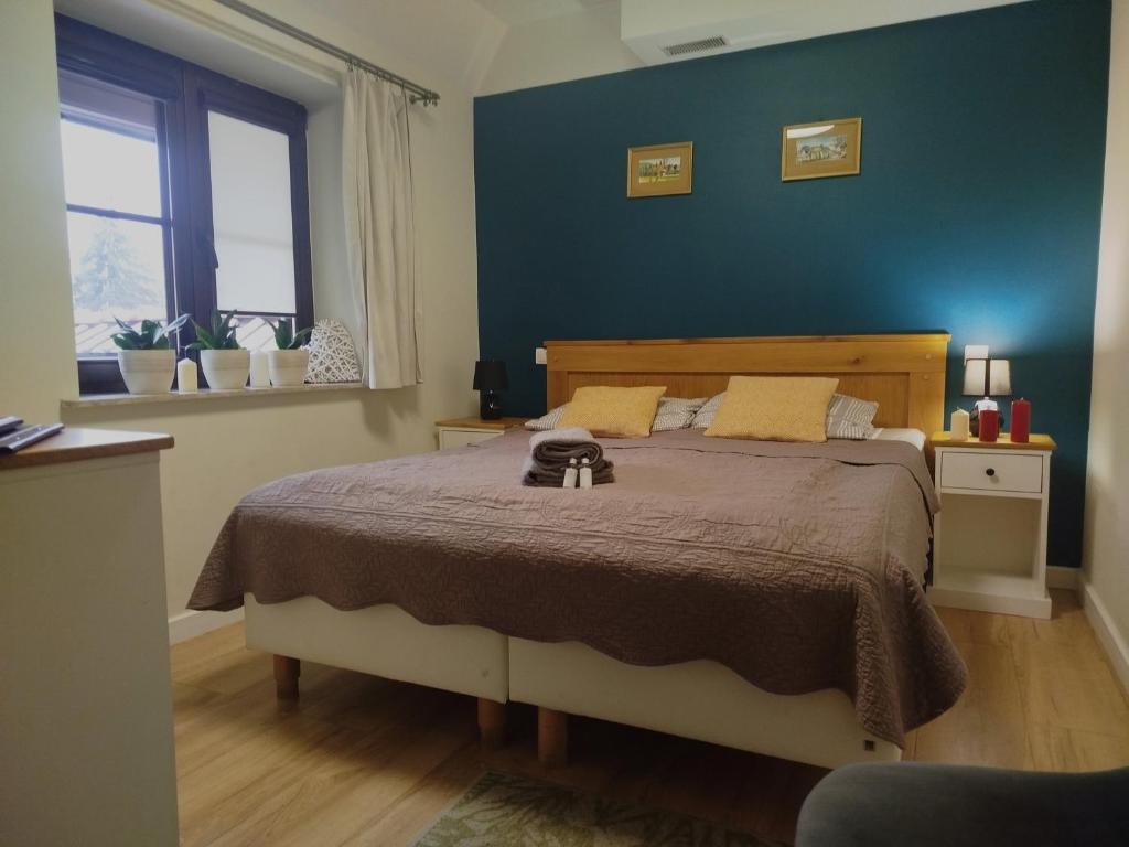 Posteľ alebo postele v izbe v ubytovaní Willa Pod Basztą Restauracja&Wellness