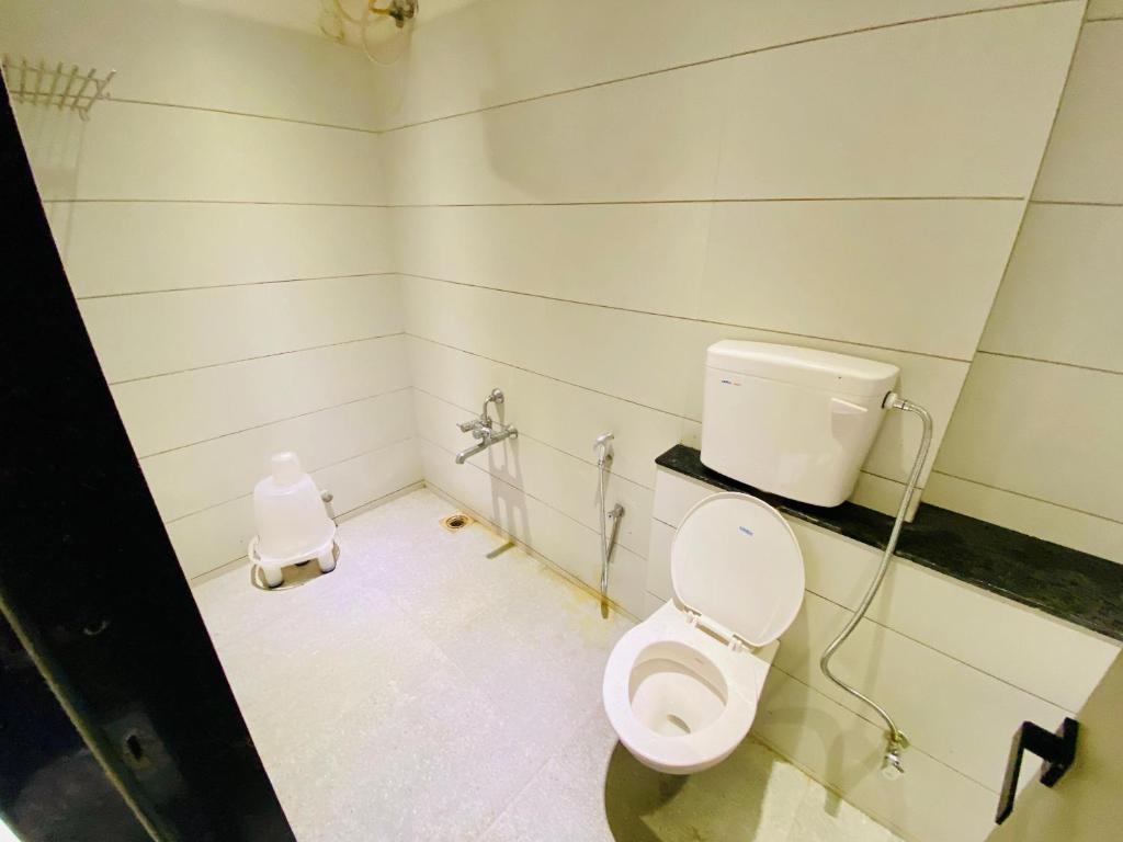 Koupelna v ubytování Hotel RV Residency