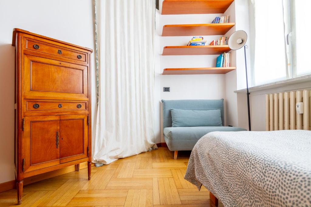 Posteľ alebo postele v izbe v ubytovaní attico con terrazzo navigli bocconi - NavigliApartments