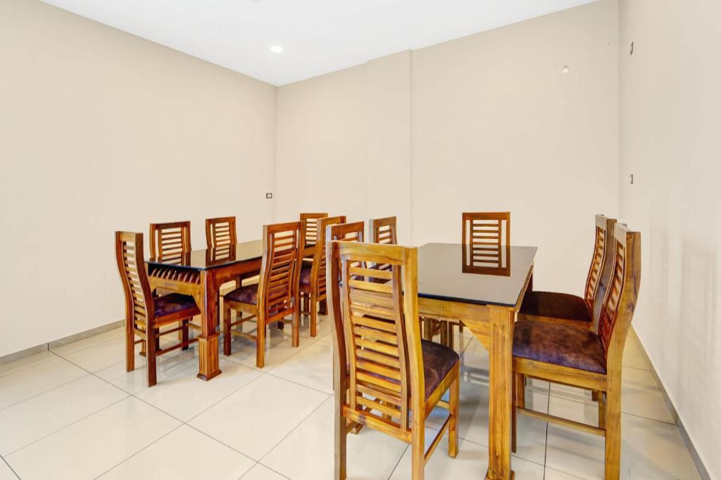 Posezení v ubytování Super Townhouse Trivandrum Near Padmanabhaswamy Temple
