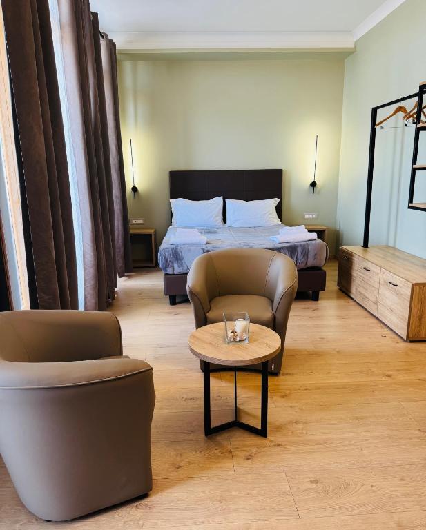 Postel nebo postele na pokoji v ubytování Manhattan Room & Suite