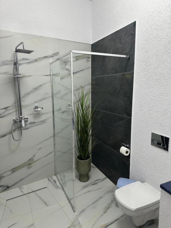 Koupelna v ubytování Hotel Rubin***