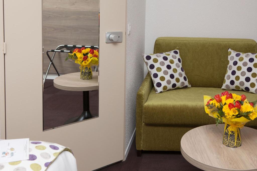 Posezení v ubytování Sure Hotel by Best Western Limoges Sud