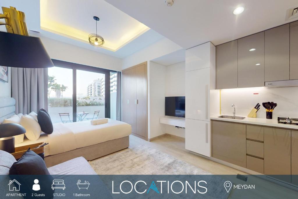 Η κουζίνα ή μικρή κουζίνα στο Azizi Riviera 9 - Bright Studio in Meydan