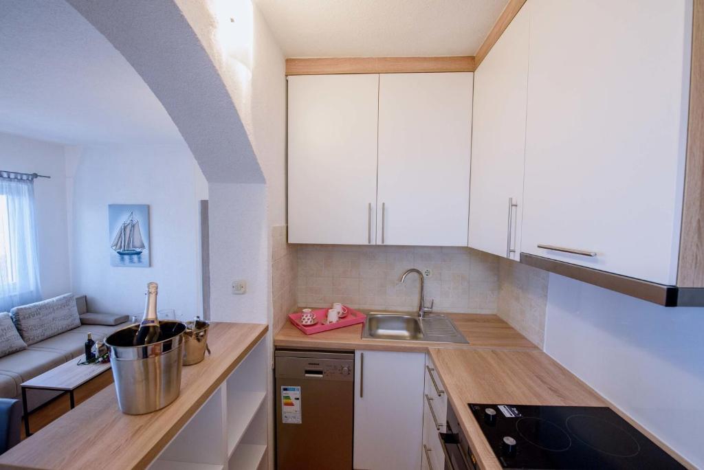 Kuchyň nebo kuchyňský kout v ubytování Villa Kathi
