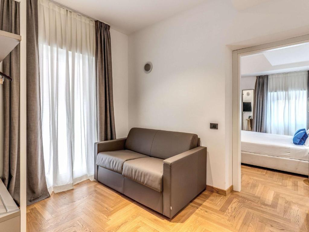 Postel nebo postele na pokoji v ubytování Mercure Roma Centro Termini