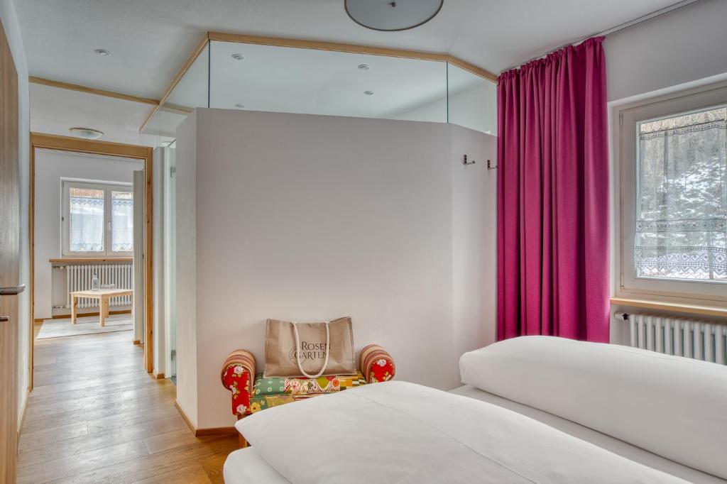 Postel nebo postele na pokoji v ubytování Hotel Berghaus Rosengarten
