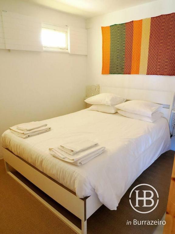 Postel nebo postele na pokoji v ubytování Herdade do Burrazeiro Turismo Rural no Alentejo