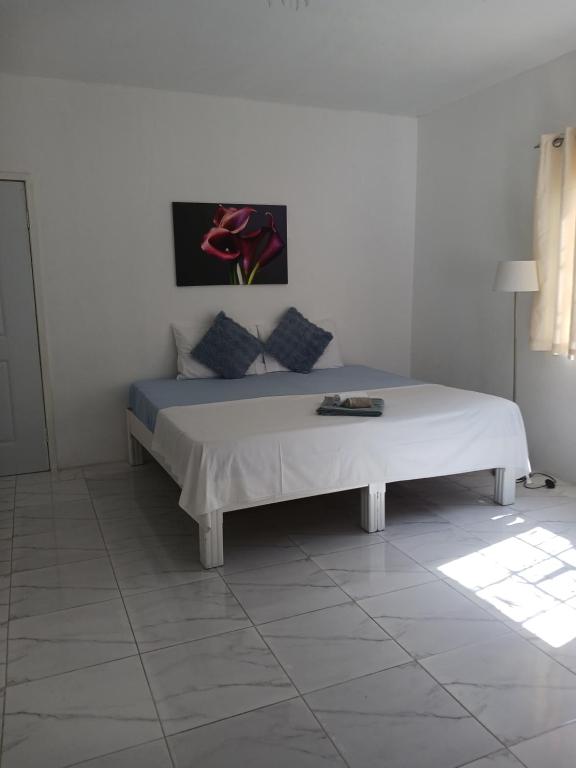 Postel nebo postele na pokoji v ubytování Hill View Rooms