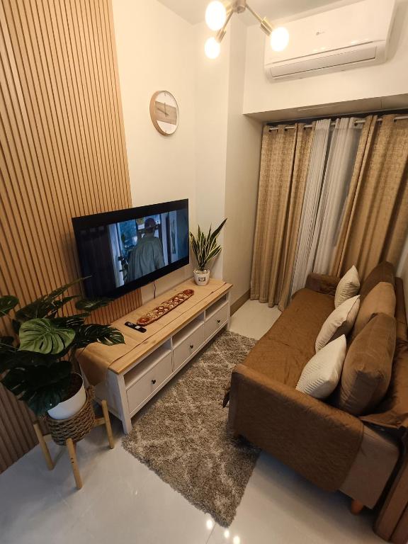 TV a/nebo společenská místnost v ubytování CLMN Staycation Metro Manila