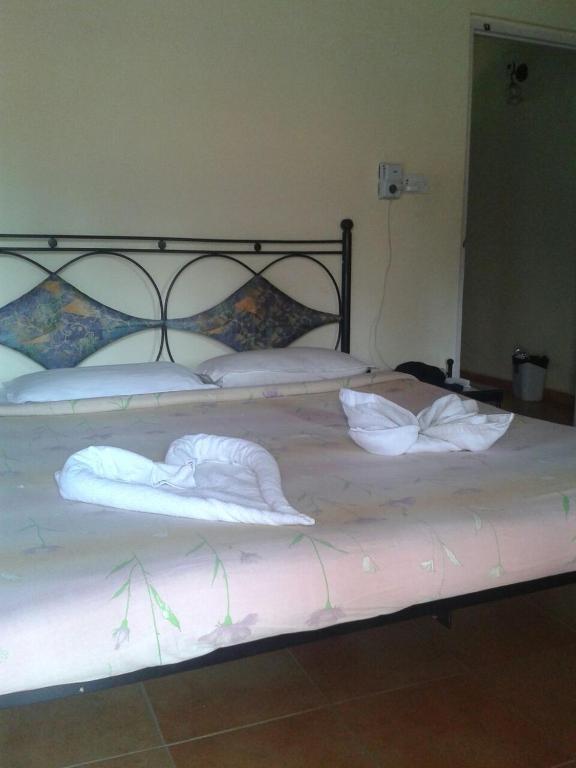 Postel nebo postele na pokoji v ubytování Libton Manor