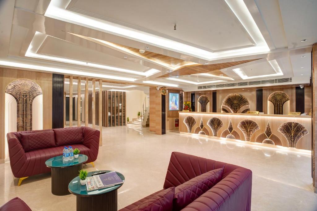 Posezení v ubytování Gold The Prime Newly Built 2 Mins From Connaught Place and Railway Station