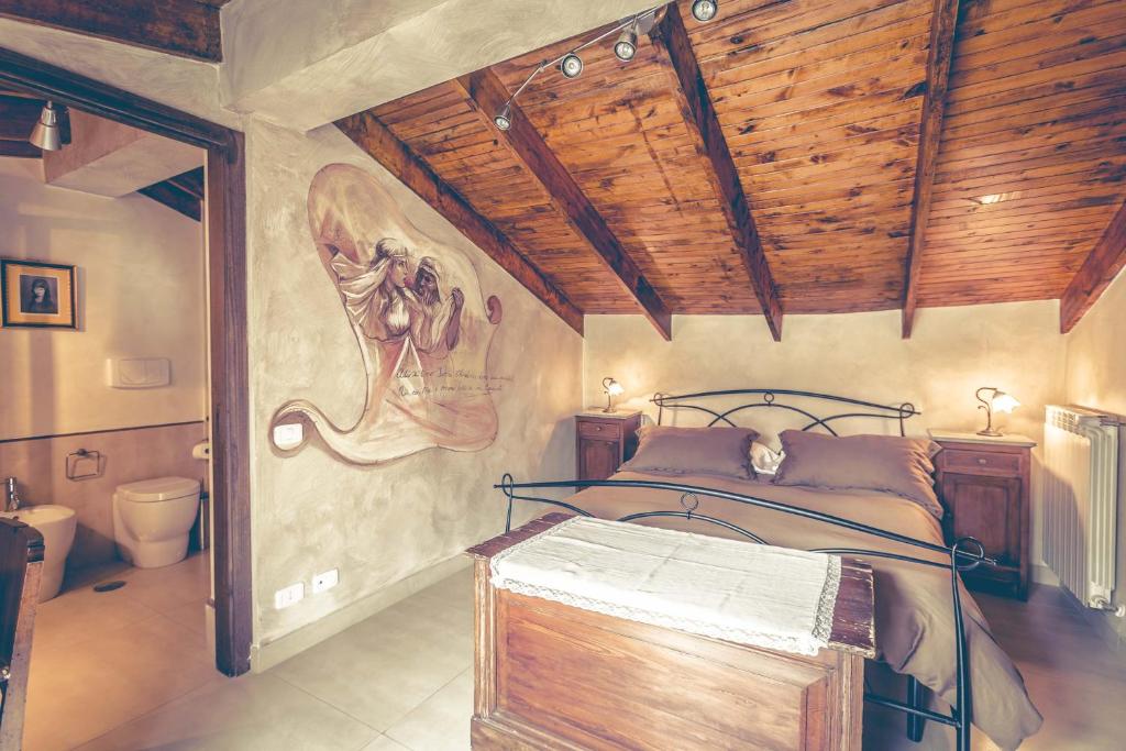 Letto o letti in una camera di Nostra Signora Del Lago