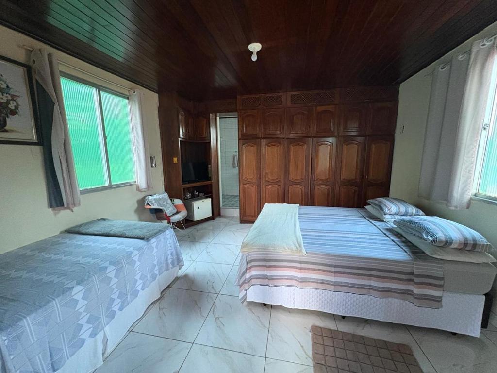 Postel nebo postele na pokoji v ubytování Apartamento Suíte em Soure.