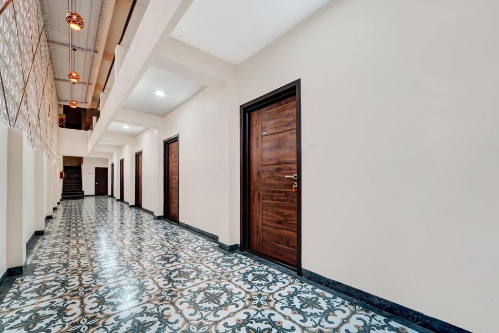 Fotografie z fotogalerie ubytování Super Hotel O Vilankurichi v destinaci Pīlamedu