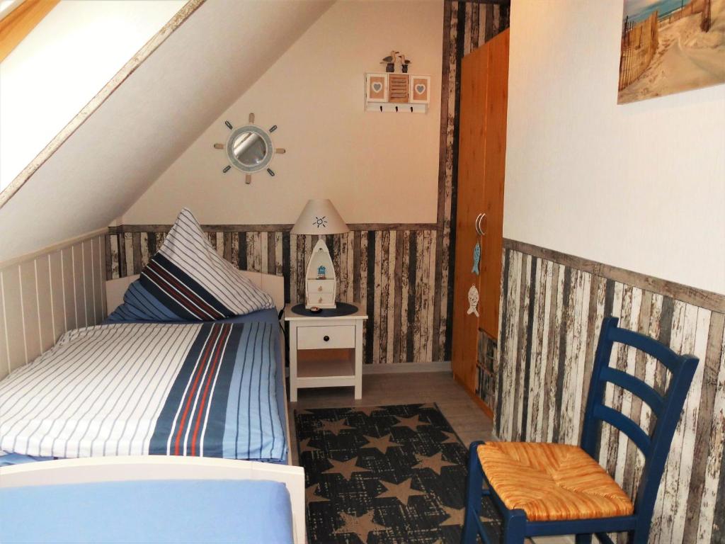 Postel nebo postele na pokoji v ubytování " HAUS ROSI " - Reihenhaus 2 - Strandnah - Ruhig - WLAN - Parkplatz - Grillplatz -Waschmaschine -