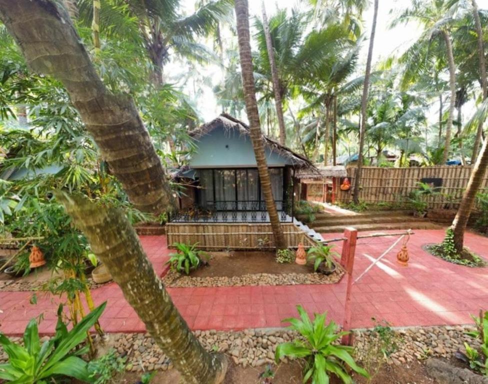 Zahrada ubytování Palm Trees Ayurvedic Heritage