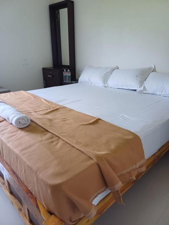 Postel nebo postele na pokoji v ubytování Saai Rooms