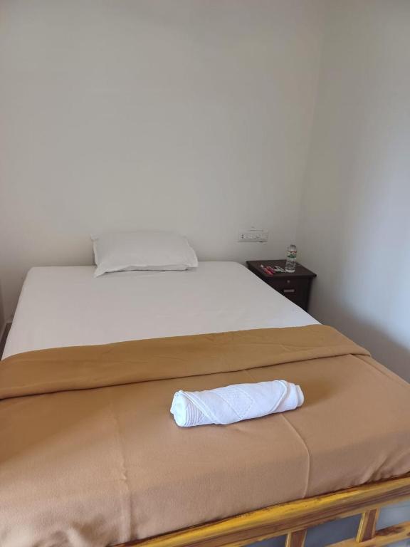Postel nebo postele na pokoji v ubytování Saai Rooms