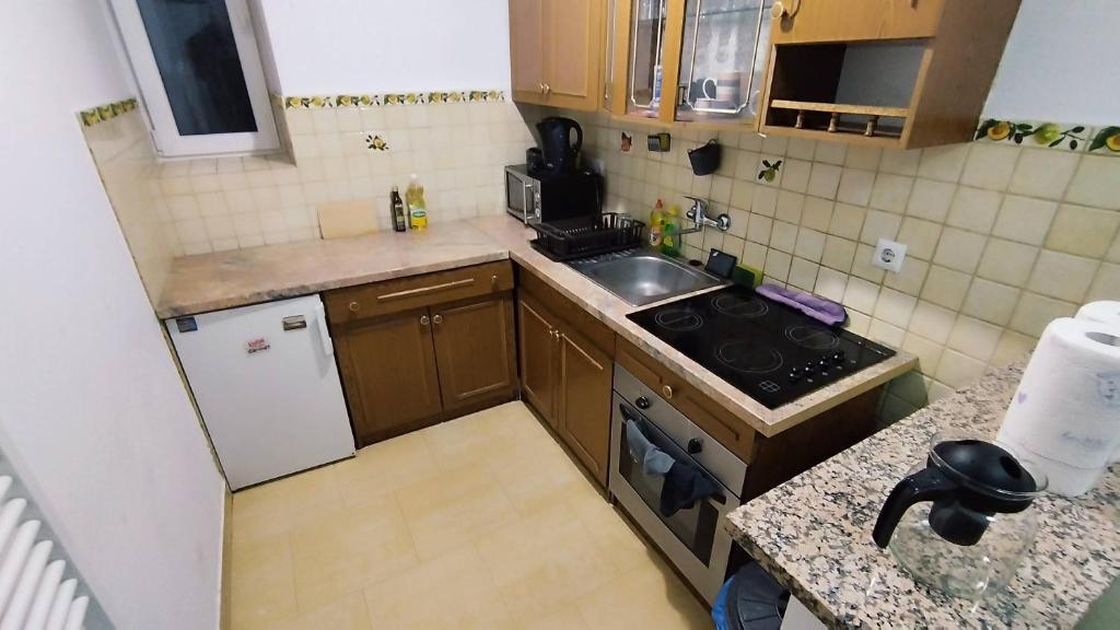 Kuchyň nebo kuchyňský kout v ubytování Work and Play Apartment