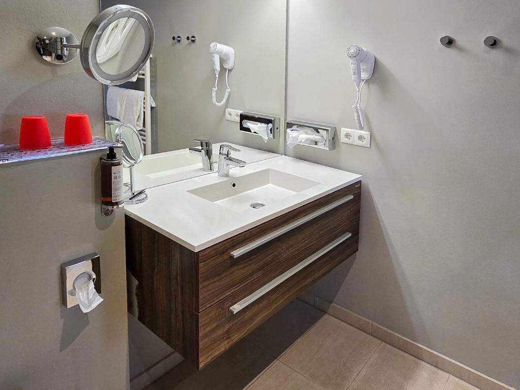 Koupelna v ubytování DORMERO Hotel Coburg