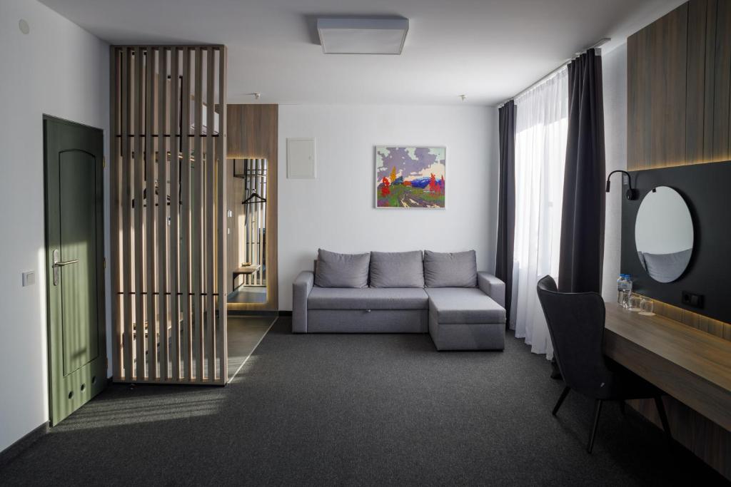 Posezení v ubytování UNGVARSKIY Thermal Hotel