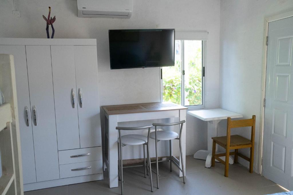 TV a/nebo společenská místnost v ubytování Suites Atlantis