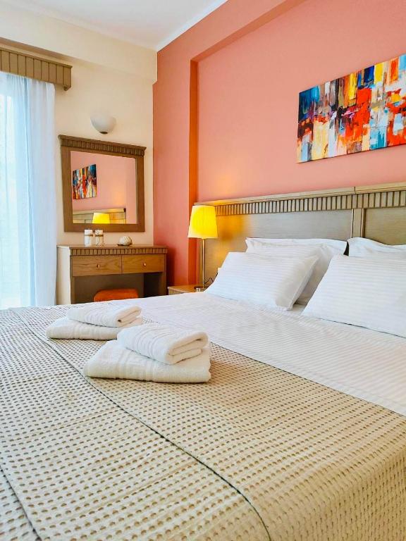Postel nebo postele na pokoji v ubytování Perdika Resort