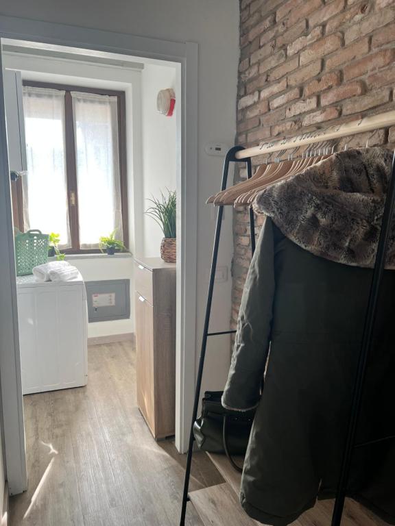 Postel nebo postele na pokoji v ubytování Bnbook La Corte 51