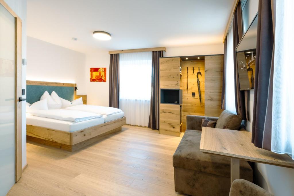 Postel nebo postele na pokoji v ubytování Hotel Oedhof