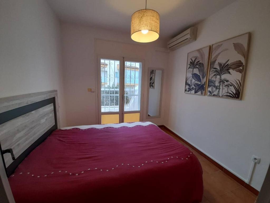 Postel nebo postele na pokoji v ubytování Casita con jardín cerca playa AV-60