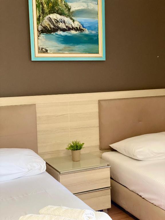 Postel nebo postele na pokoji v ubytování Hotel Bojko