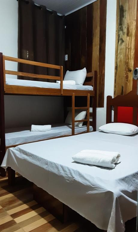 Postel nebo postele na pokoji v ubytování Albergue Flor do Caribe