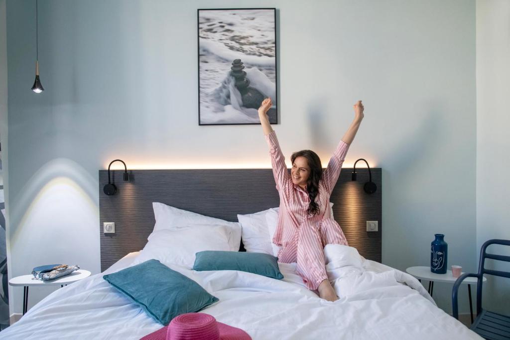 Postel nebo postele na pokoji v ubytování Best Western Alba