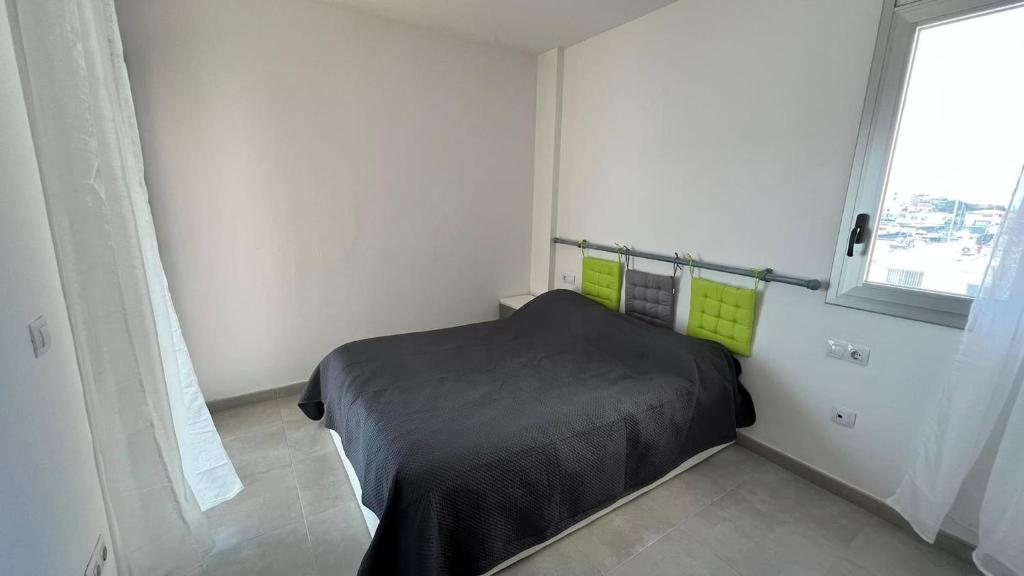 Posteľ alebo postele v izbe v ubytovaní Apartamento acogedor con piscina en Santa Margarita