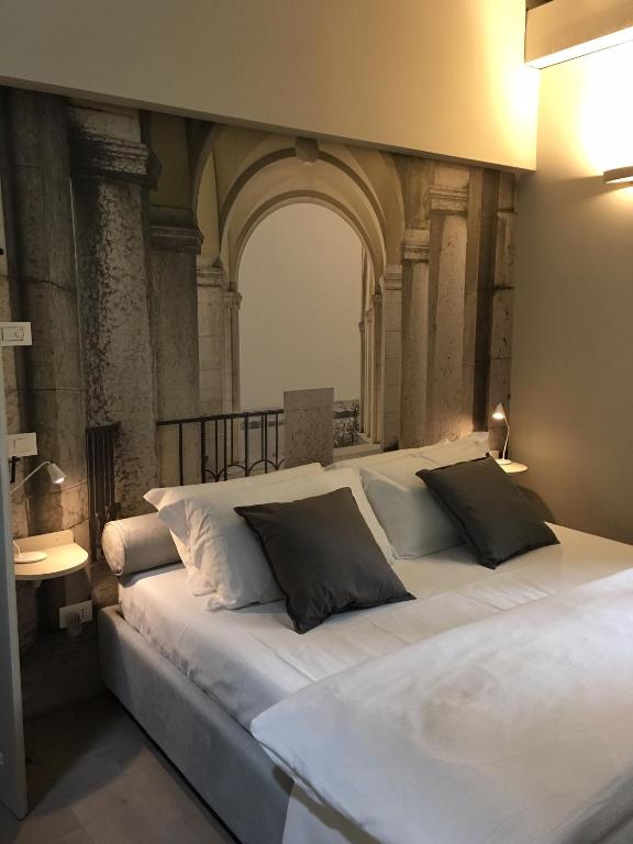 Posteľ alebo postele v izbe v ubytovaní B&B Antico Brolo