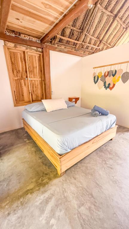 Voodi või voodid majutusasutuse Encanto Hostel toas