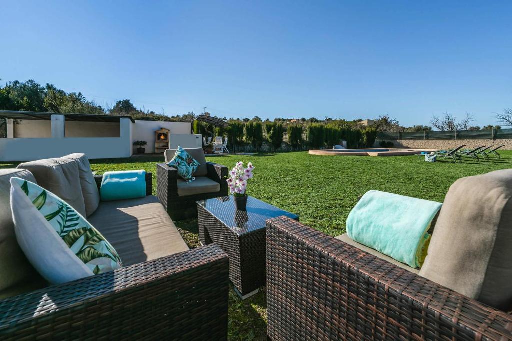 A seating area at Villa Vinyes by Villa Plus