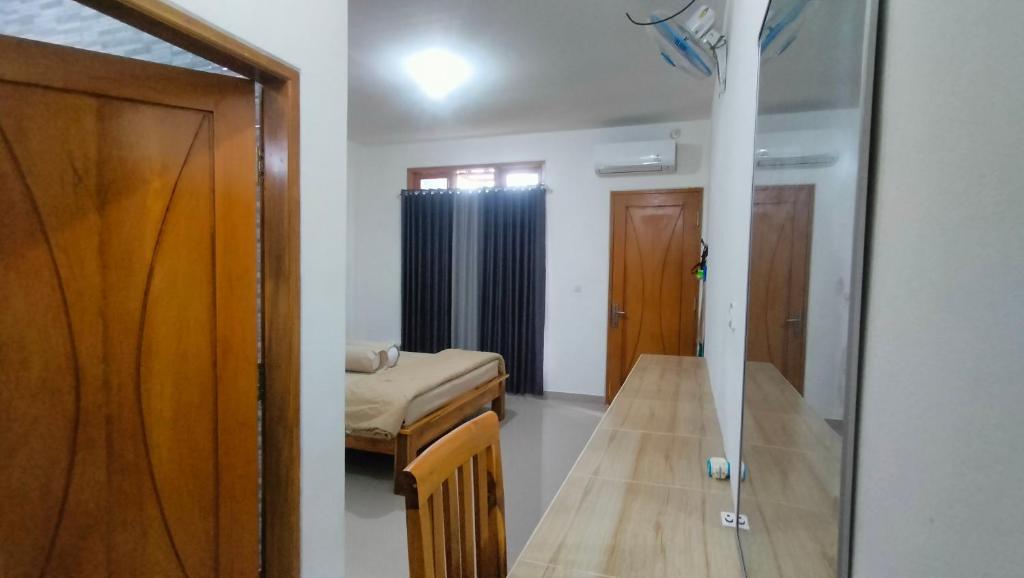 Postel nebo postele na pokoji v ubytování P'Moon Open Inn