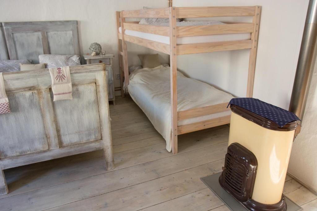 Postel nebo postele na pokoji v ubytování Adnev Bohemia FARMA